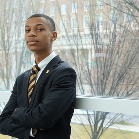 Armand Raynor’s headshot.