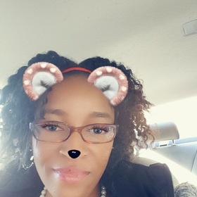 Keishaw Belle Burnett’s headshot.