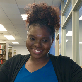 Candy Sydney’s headshot.