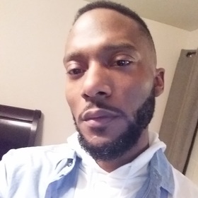 Larry James’ headshot.