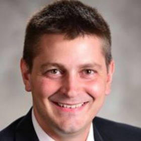 Justin Stowe’s headshot.