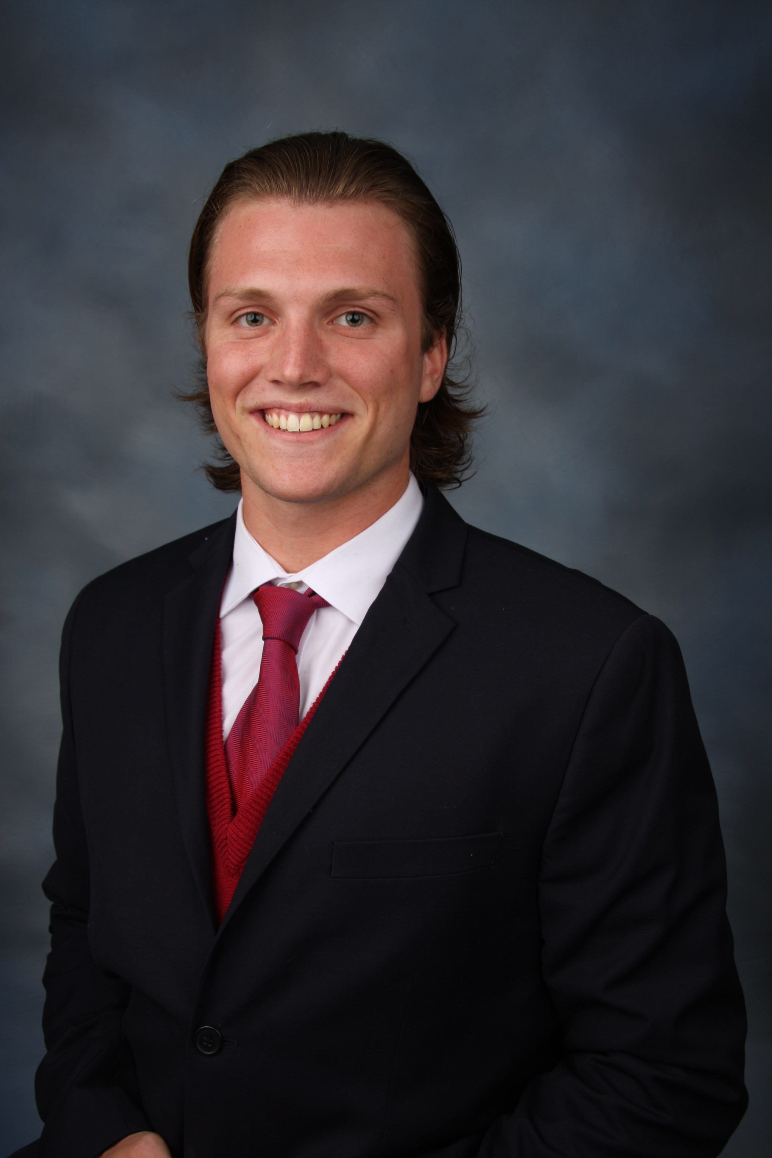 Placeholder headshot for John Barnett.