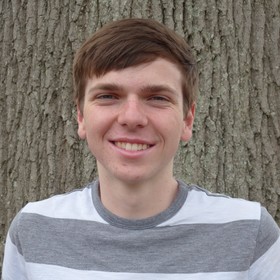 Alex Lehman’s headshot.