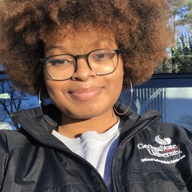 Zameh Omonuwa’s headshot.