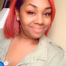 Che'Quella Hood’s headshot.