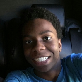 Joshua Baynes’ headshot.