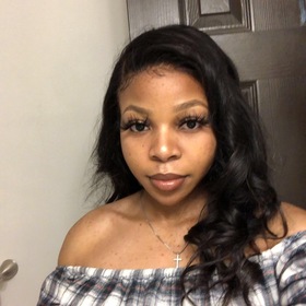 Alysia Threatts’ headshot.