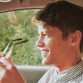 Cameron Tangco’s headshot.