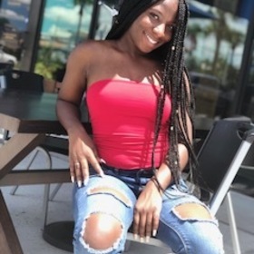 Jasmine Delamar’s headshot.