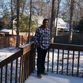 Kariuki Gitau’s headshot.