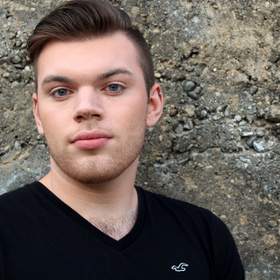 Jacob Barrett’s headshot.