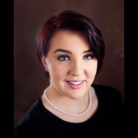 Andromeda Elliott’s headshot.
