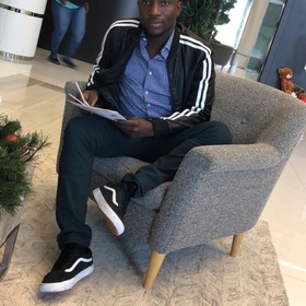 Taofeek Ibrahim’s headshot.