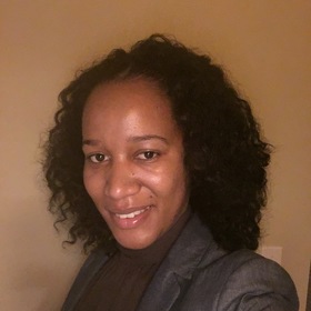 Colette Dinala’s headshot.