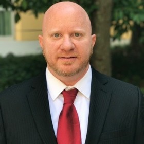 Joel Silverman’s headshot.