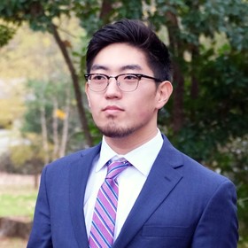 Jonathan Moon’s headshot.