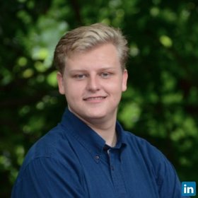 Mitchell Zwecker’s headshot.