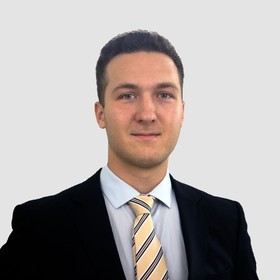 Baran Usluel’s headshot.