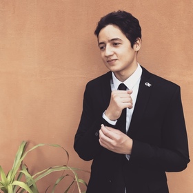 Malek Amiri’s headshot.