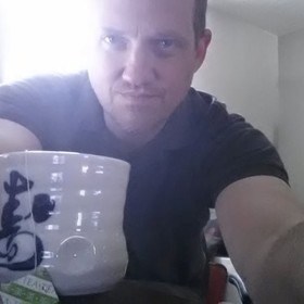 Christopher Nicholson’s headshot.