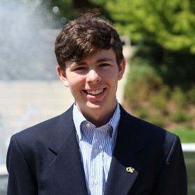 Austin Mitchell’s headshot.