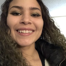 Maya Greene’s headshot.