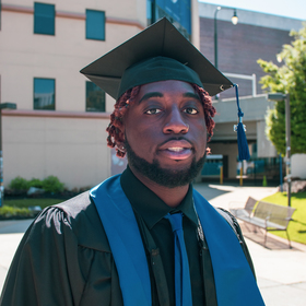Isaiah Humes’ headshot.