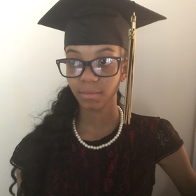 Cyann Owes’ headshot.