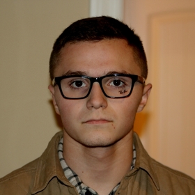 Cameron Brown’s headshot.