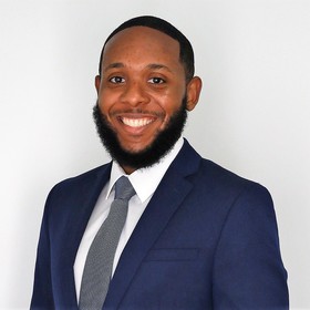 Dustin Reese’s headshot.