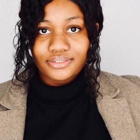 Tiffany Adoghe’s headshot.