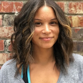 Ashly Dennis’ headshot.