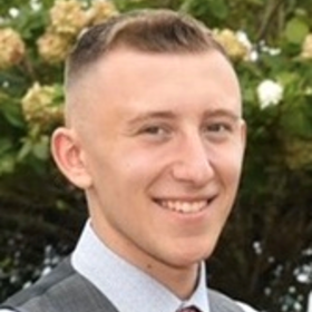 Joshua Forgione’s headshot.