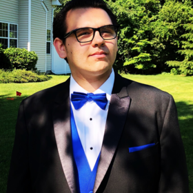 Christian Serrecchia’s headshot.
