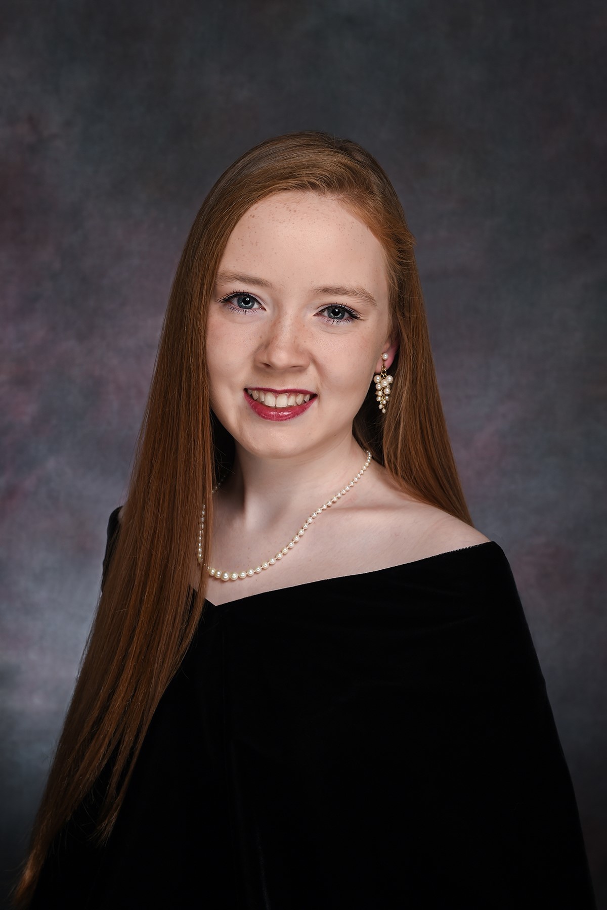 Placeholder headshot for Olivia Kane.