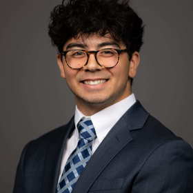 John Houk’s headshot.