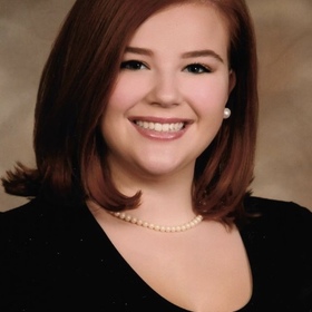 Ts Burnham’s headshot.