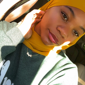 Fajar Al-Mujahid’s headshot.