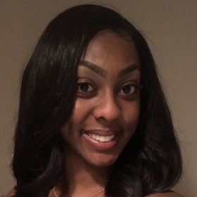 Keyara Curry-sims’ headshot.