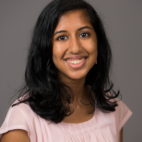 Rhea Mathew’s headshot.