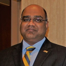 Raj Boini’s headshot.