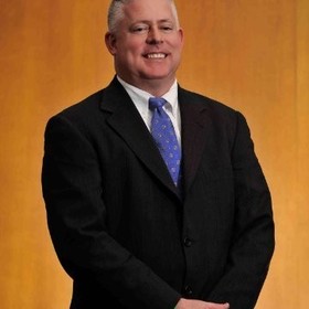 Leonard Boyer’s headshot.