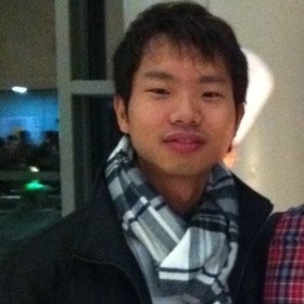 Jin Tang’s headshot.