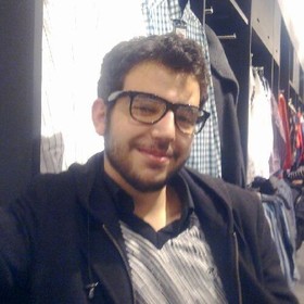 Oguzhan Togay’s headshot.