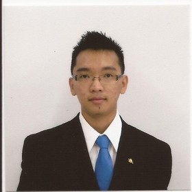 Adrian Kok Chun Chia’s headshot.