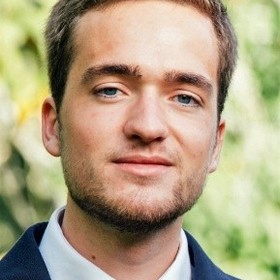 Simon Tabutin’s headshot.