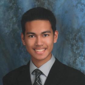 Joshua Frial’s headshot.