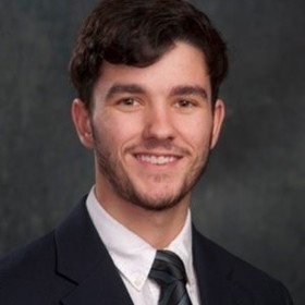 Benjamin Flamm’s headshot.