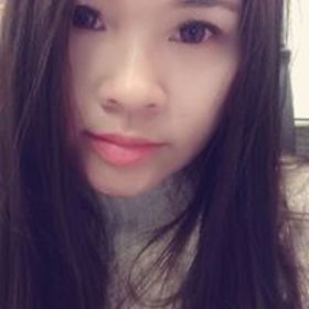 Fang Wang’s headshot.