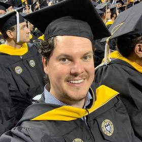 Carlos Aguayo’s headshot.